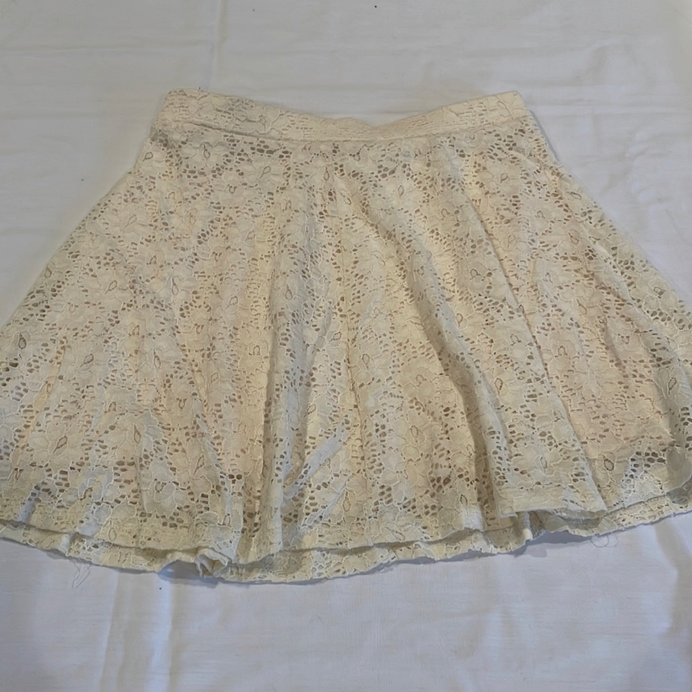Cream lined lace mini skirt